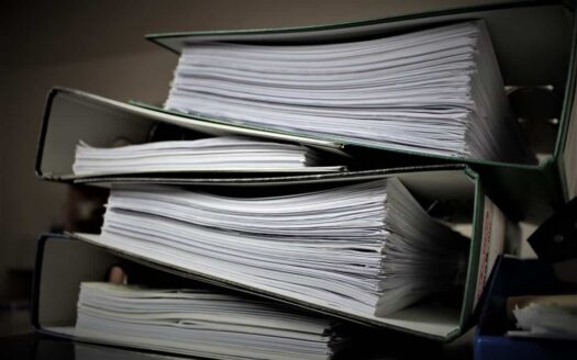 a stack of notebooks that may be provided in response to requests for production