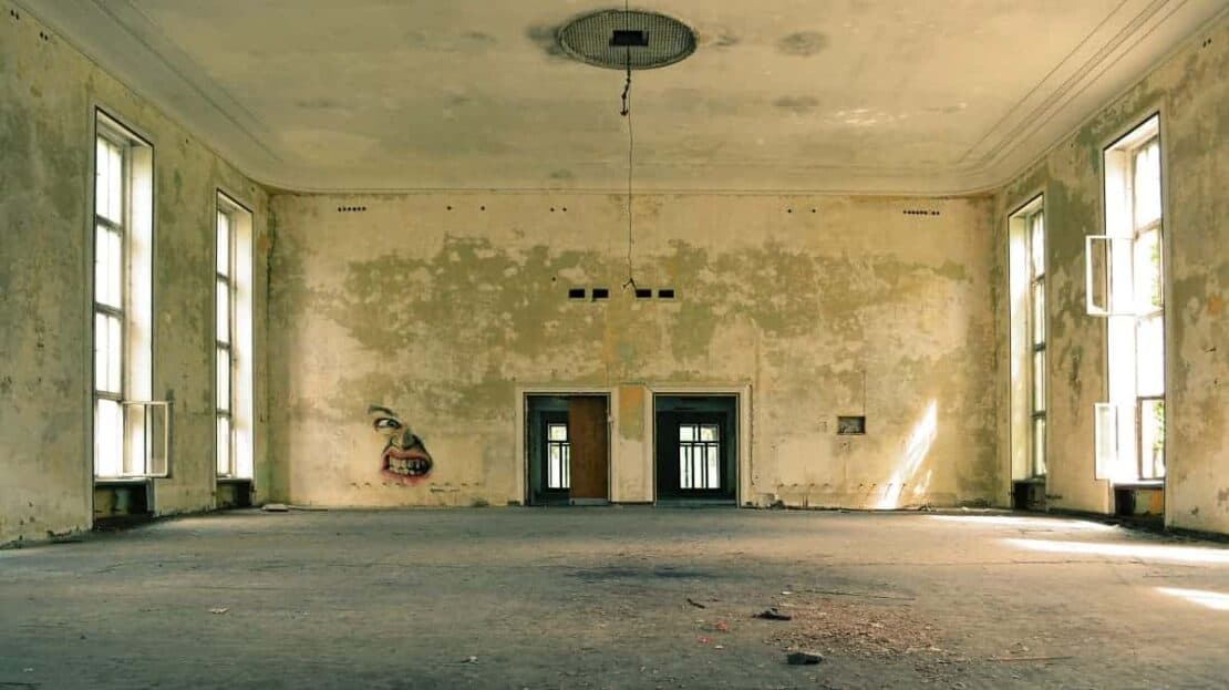 a photo of a run down house that may be the aftermath of a contract for deed horror story