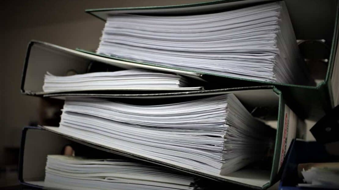 a stack of notebooks that may be provided in response to requests for production