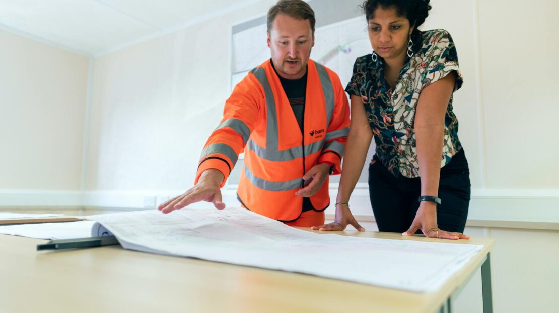 engineers looking at blueprint